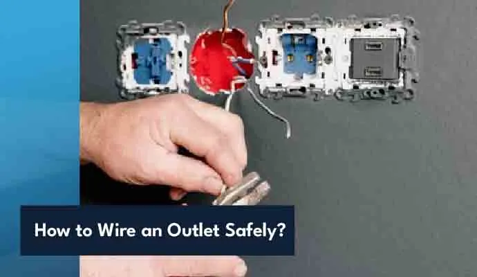 Electrician wiring a standard electrical outlet following safe installation practices.