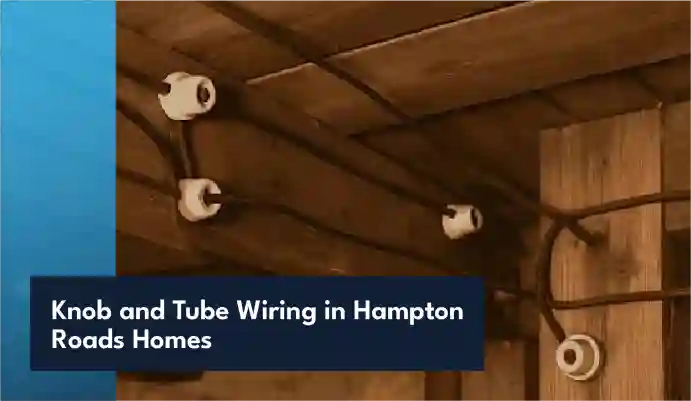 Electrician inspecting knob and tube wiring in an older house